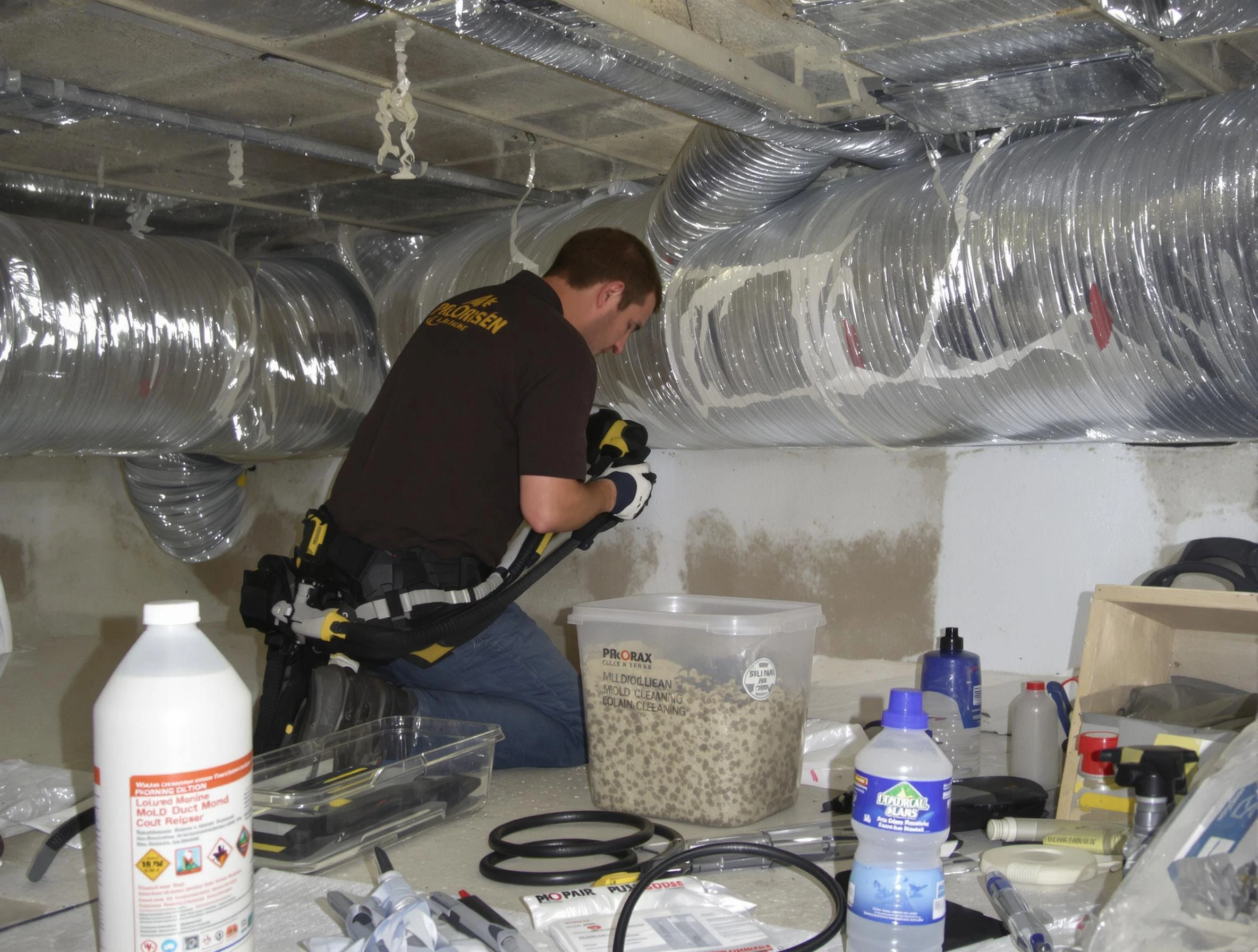 Edmond Air Duct Cleaning specialist performing professional mold removal from air ducts in Edmond